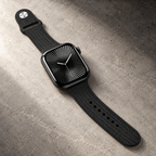 HK11 Pro Max black watch with textured adjustable band on tabletop